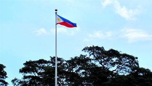The Flag of the Philippines Flying Over Intramuros