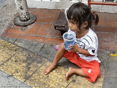 Poor Kids are Often Seen Holding Cups & Begging for Change
