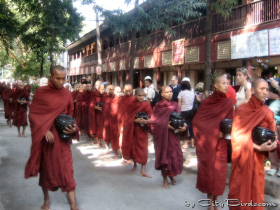 Procession of Buddhist Monks in Mandalay, Burma (Myanmar)