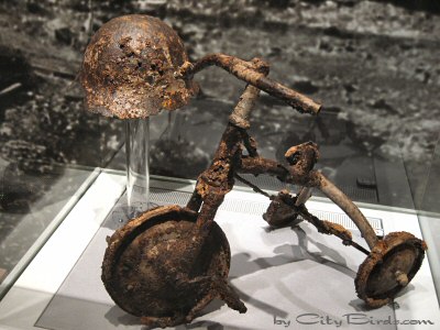 A Helmet and Tricycle after the A-bomb Exploded over Hiroshima, on Display at the Hiroshima Peace Memorial Museum
