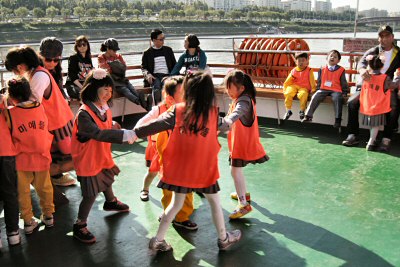 Happy Children During a Han River Cruise in Seoul